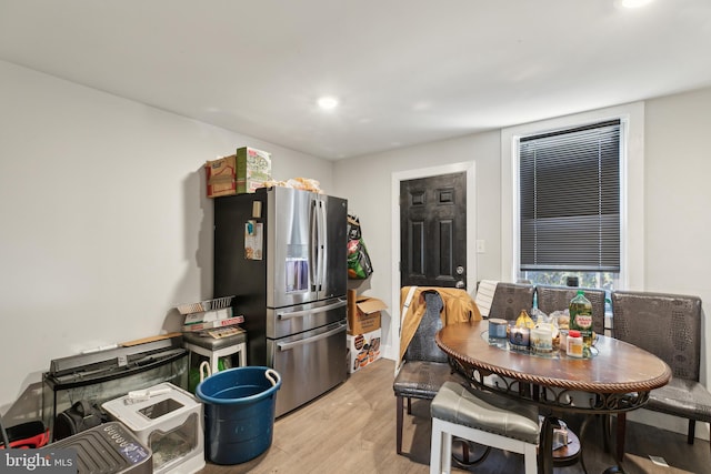 dining room with light hardwood / wood-style floors