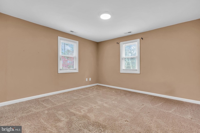 view of carpeted spare room