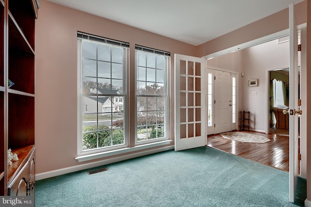 foyer featuring hardwood / wood-style flooring