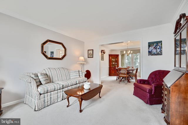 living room with crown molding, light carpet, and a chandelier