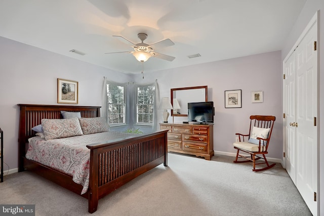 bedroom featuring carpet, a closet, and ceiling fan