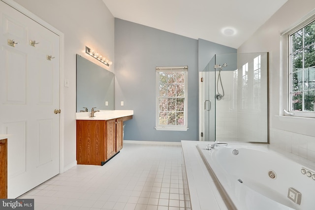 bathroom with separate shower and tub, tile patterned floors, vanity, and vaulted ceiling