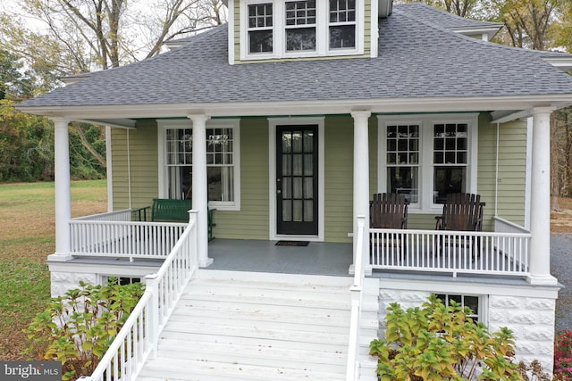 entrance to property with a porch