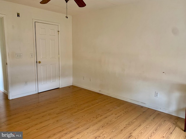 interior space with ceiling fan and light hardwood / wood-style floors