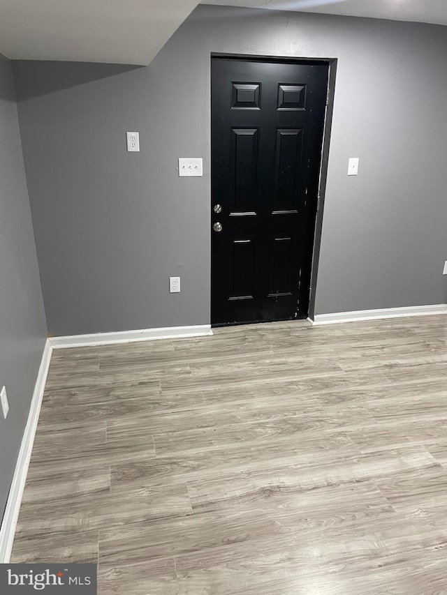 foyer entrance featuring light hardwood / wood-style flooring