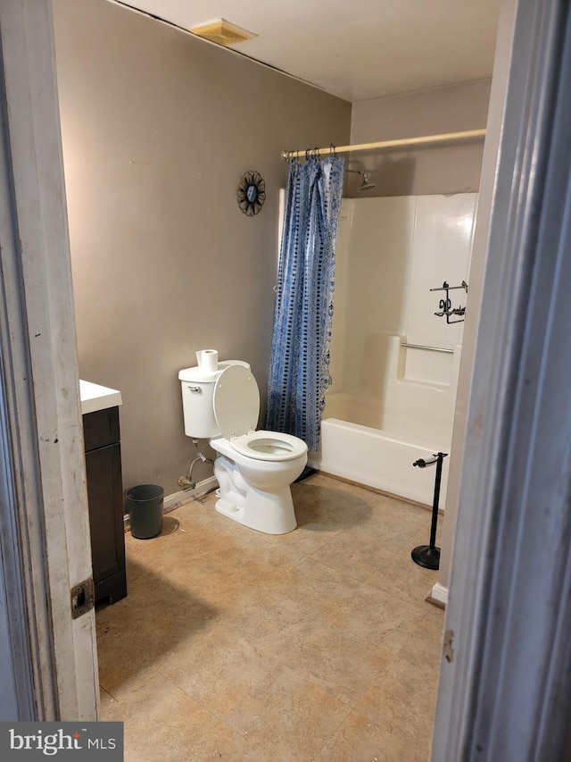 2024 Yew Ct, Saint Leonard, MD 20685 - full bath featuring toilet, vanity, and shower / bath combo with shower curtain