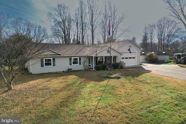 single story home featuring a front yard and a garage