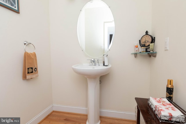 bathroom featuring hardwood / wood-style flooring and sink