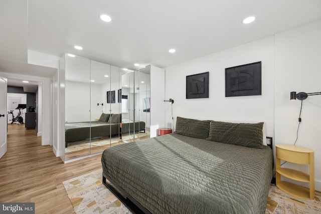 bedroom featuring light wood-type flooring