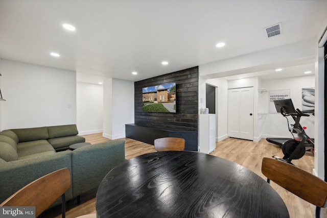 living room with light hardwood / wood-style flooring