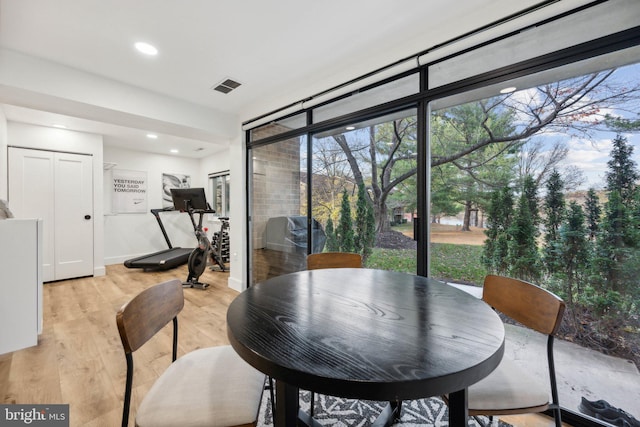 dining room featuring light hardwood / wood-style floors