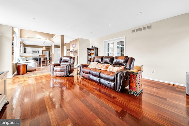 living room with hardwood / wood-style floors