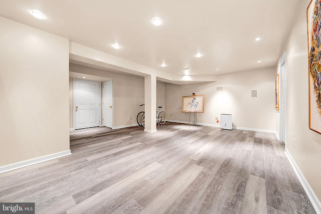 unfurnished living room featuring light hardwood / wood-style floors