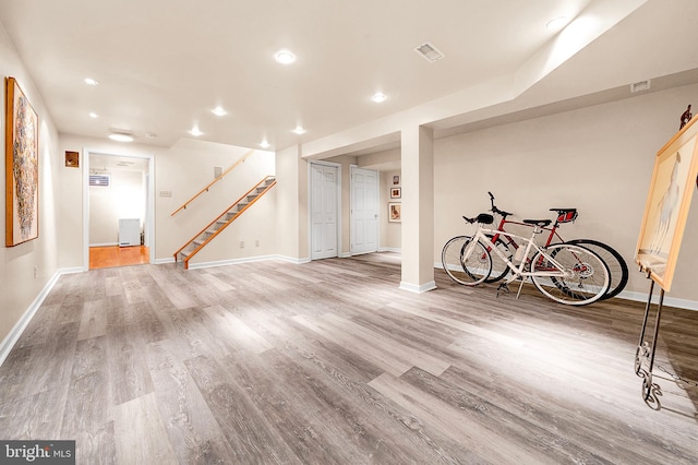 basement featuring hardwood / wood-style floors