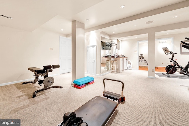 workout area with light carpet