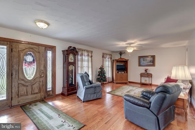 310 Updyke Rd, Littlestown, PA 17340 - living area featuring light wood-type flooring, baseboards, and a ceiling fan