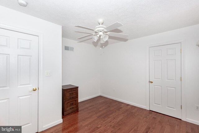 310 Updyke Rd, Littlestown, PA 17340 - empty room with a ceiling fan, wood finished floors, a smoke detector, baseboards, and a textured ceiling