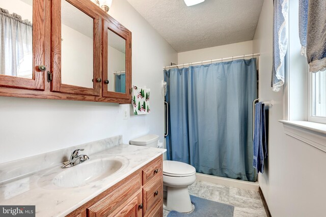 310 Updyke Rd, Littlestown, PA 17340 - bathroom with toilet, vanity, curtained shower, and a textured ceiling
