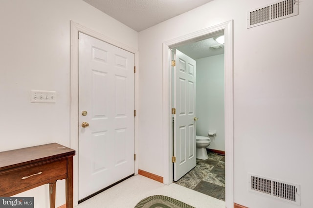 310 Updyke Rd, Littlestown, PA 17340 - entrance foyer featuring baseboards and a textured ceiling