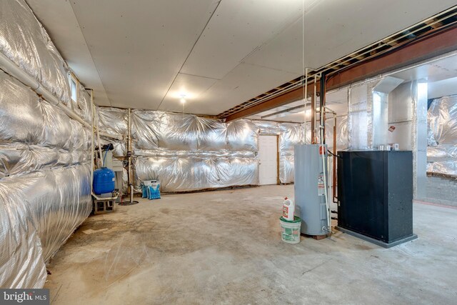 310 Updyke Rd, Littlestown, PA 17340 - unfinished below grade area featuring water heater and a water pressure tank