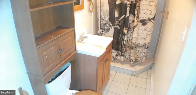 bathroom featuring a shower with curtain, tile patterned flooring, and vanity