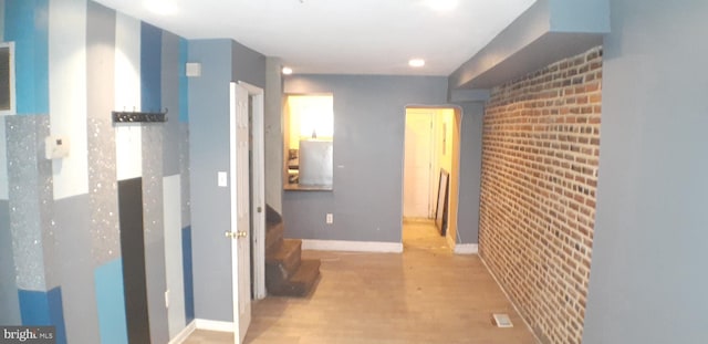 hall featuring light hardwood / wood-style flooring