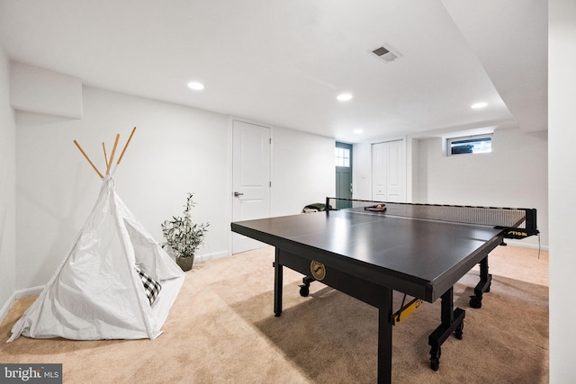 playroom with light colored carpet