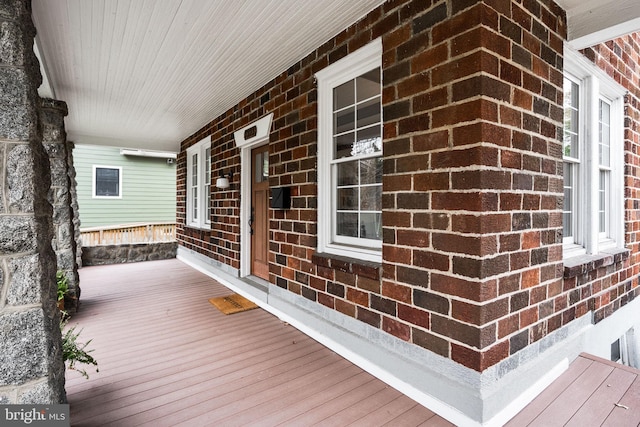 wooden deck with a porch