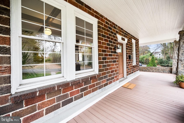 wooden terrace with covered porch