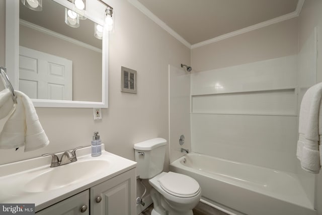 full bathroom featuring crown molding, toilet, vanity, and tub / shower combination