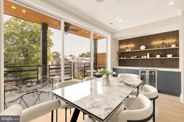 sunroom featuring beverage cooler