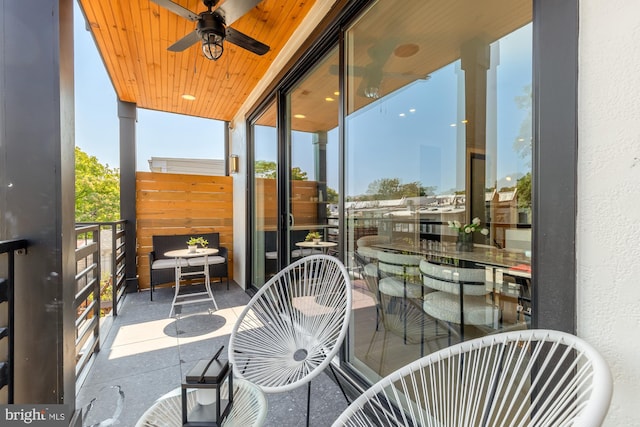 balcony featuring ceiling fan