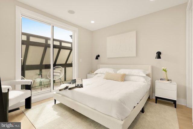 bedroom with light wood-type flooring