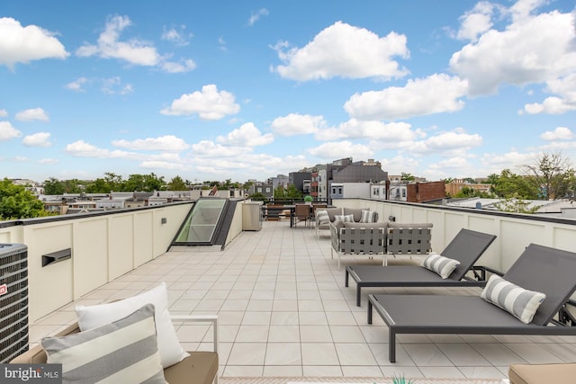 view of patio featuring outdoor lounge area and central air condition unit