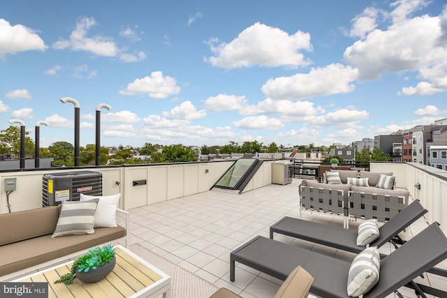 view of patio / terrace with an outdoor hangout area and central AC