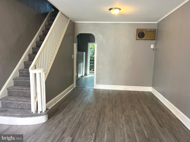 1635 S Etting St, Philadelphia, PA 19145 - empty room with arched walkways, wood finished floors, crown molding, baseboards, and stairs
