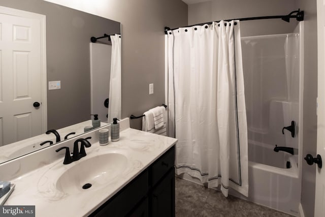 bathroom featuring shower / tub combo with curtain and vanity