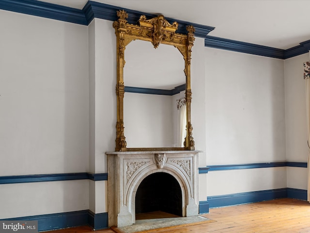 room details with crown molding and wood-type flooring