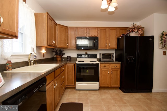 kitchen with sink and black appliances