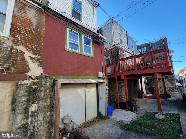 rear view of property with a deck