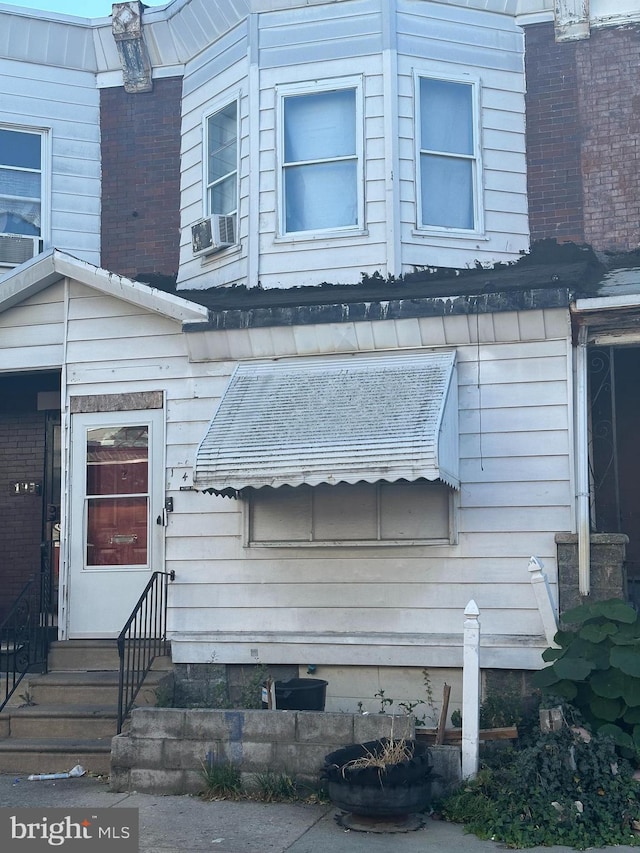 entrance to property with cooling unit