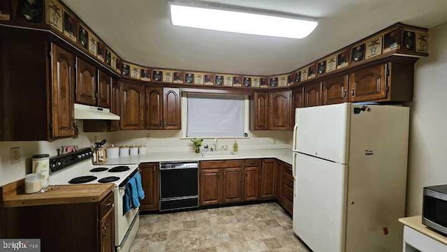 kitchen featuring dark brown cabinets, white appliances, and sink