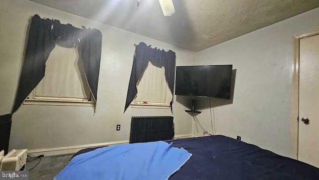 bedroom featuring ceiling fan