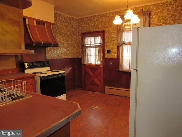 kitchen featuring white appliances, exhaust hood, an inviting chandelier, ornamental molding, and baseboard heating