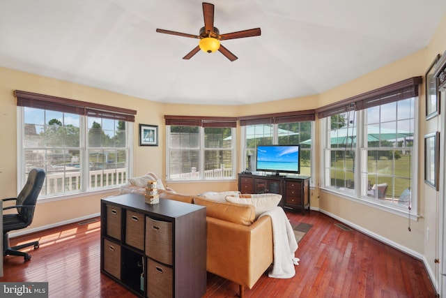 sunroom / solarium featuring ceiling fan and lofted ceiling