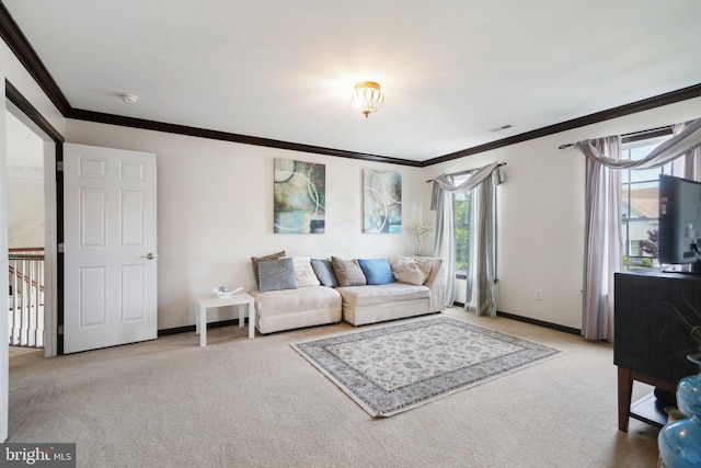 carpeted living room with ornamental molding