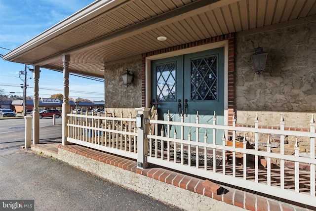 entrance to property featuring french doors