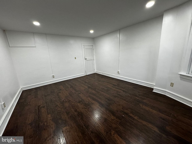 spare room featuring hardwood / wood-style flooring