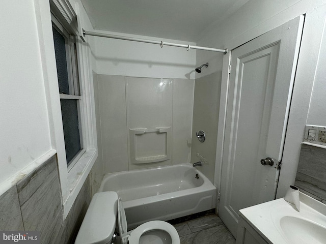 full bathroom featuring shower / bathing tub combination, vanity, and toilet