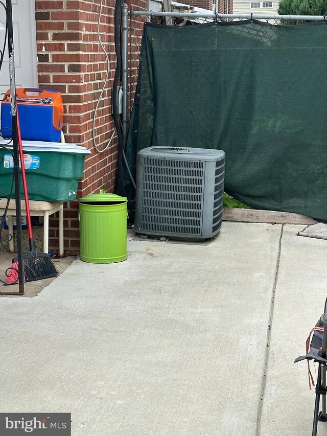 1601 W Venango St, Philadelphia, PA 19140 - exterior view of central AC unit and brick siding